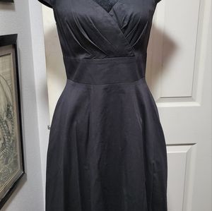 Junior's black dress w/ pockets.